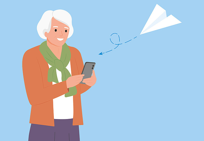 Illustration: Ein älterer Erwachsener mit weißen Haaren, der eine orangefarbene Strickjacke und einen grünen Schal trägt, lächelt, während er ein Smartphone benutzt. Ein Papierflugzeug und eine gepunktete Linie zeigen an, dass eine Nachricht gesendet wird. Der Hintergrund ist hellblau.